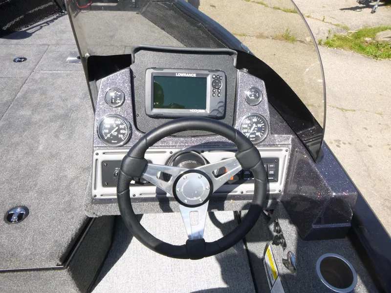 Slide: The Image of 2024 Ranger VS1682SC Angler dashboard with steering wheel and Lowrance display. - 7