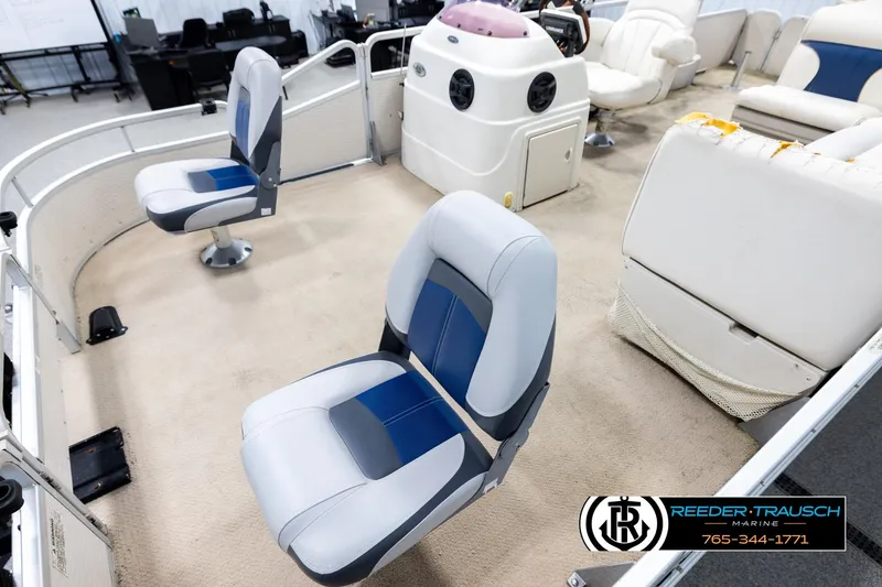 Slide: The Image of 2007 Premier 2223 Navigator boat interior with seating and control console. - 10