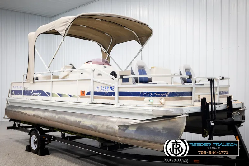 Slide: The Image of 2007 Premier 2223 Navigator pontoon boat on trailer in indoor storage. - 3