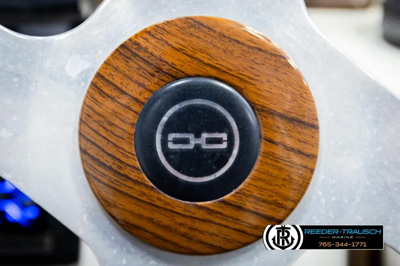 Slide: The Image of Steering wheel detail of 2007 Premier 2223 Navigator boat with wood finish. - 31