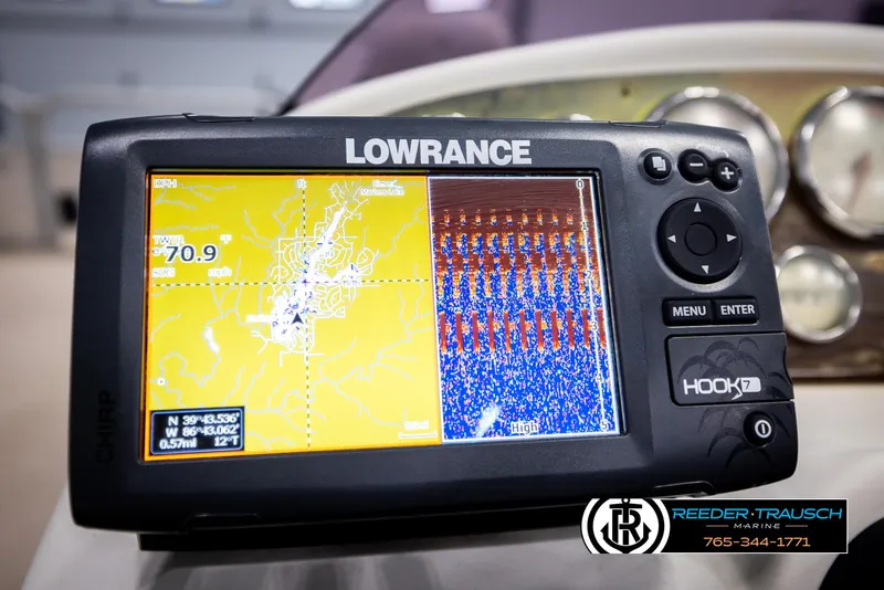 Slide: The Image of Lowrance Hook 7 GPS on 2007 Premier 2223 Navigator boat dashboard. - 33