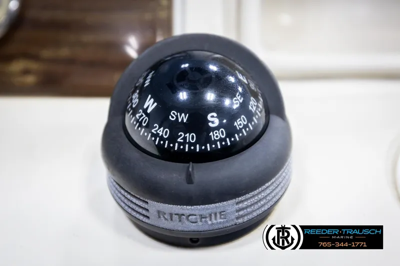 Slide: The Image of Compass on a 2007 Premier 2223 Navigator boat, featuring Ritchie branding. - 35