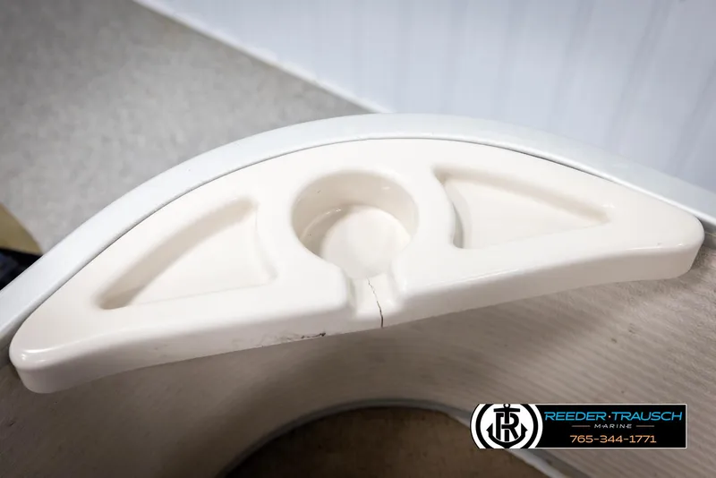 Slide: The Image of Boat cup holder on a 2007 Premier 2223 Navigator, featuring Reeder-Trausch Marine branding. - 42