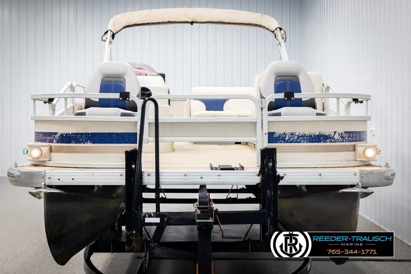 Slide: The Image of 2007 Premier 2223 Navigator pontoon boat in showroom, rear view. - 8