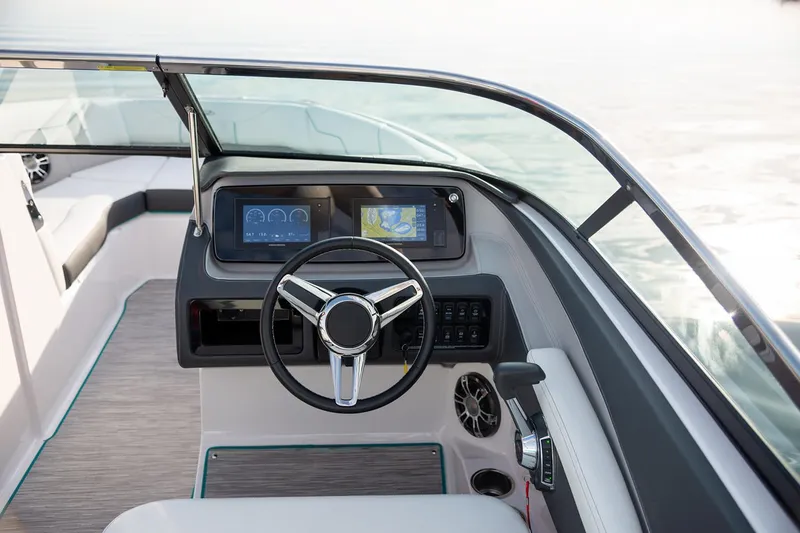 Slide: The Image of Manufacturer Provided Image: 2020 Regal LS4 Surf boat dashboard with steering wheel and digital displays. - 16