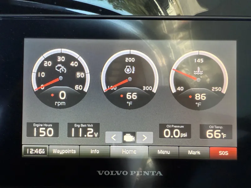 Slide: The Image of Dashboard display of a 2020 Regal LS4 Surf boat showing engine metrics and settings. - 4