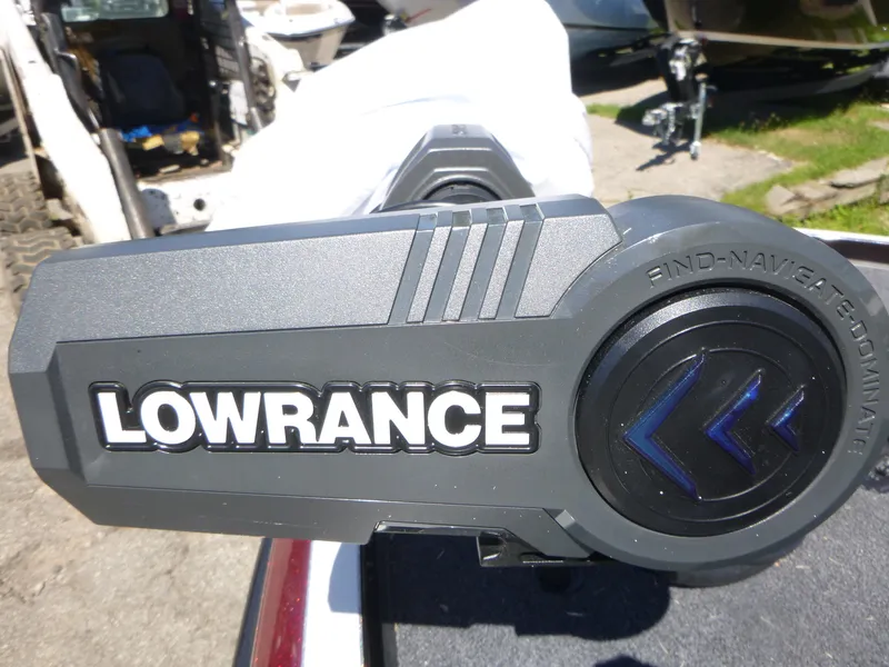 Slide: The Image of Lowrance equipment on 2024 Ranger Z521R Ranger Cup boat, outdoor setting. - 12