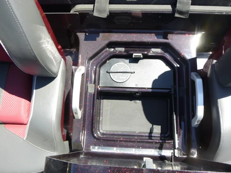 Slide: The Image of 2024 Ranger Z521R Ranger Cup Equipped boat storage compartment with red accents. - 18