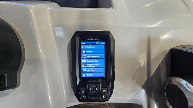 Slide: The Image of Garmin device on 2020 Bennington 188 SV boat dashboard displaying navigation options. - 15