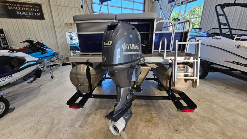 Slide: The Image of 2020 Bennington 188 SV pontoon boat with Yamaha 60 HP outboard motor in showroom. - 5