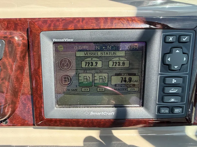 Slide: The Image of SmartCraft VesselView display on 2012 Sea Ray 370 Sundancer showing vessel status and fuel levels. - 19