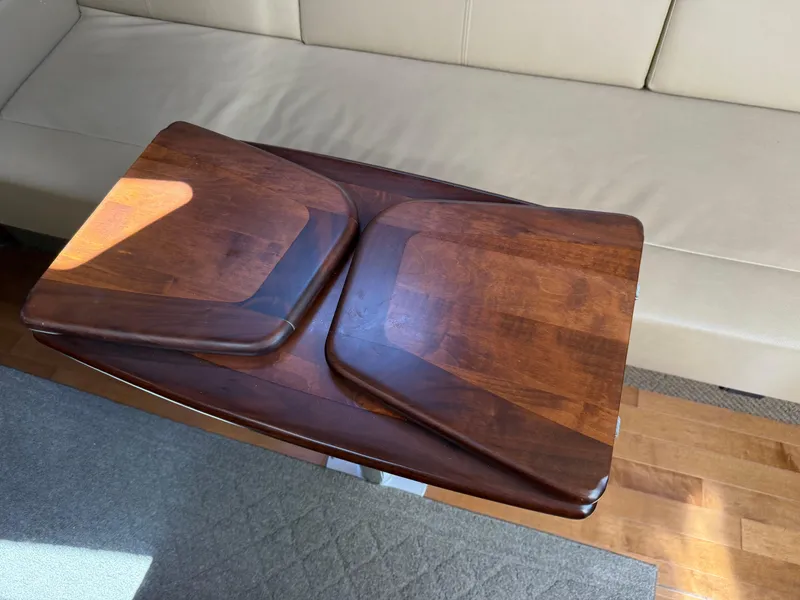Slide: The Image of Wooden table on Sea Ray 370 Sundancer yacht, 2012 model, with beige seating. - 43