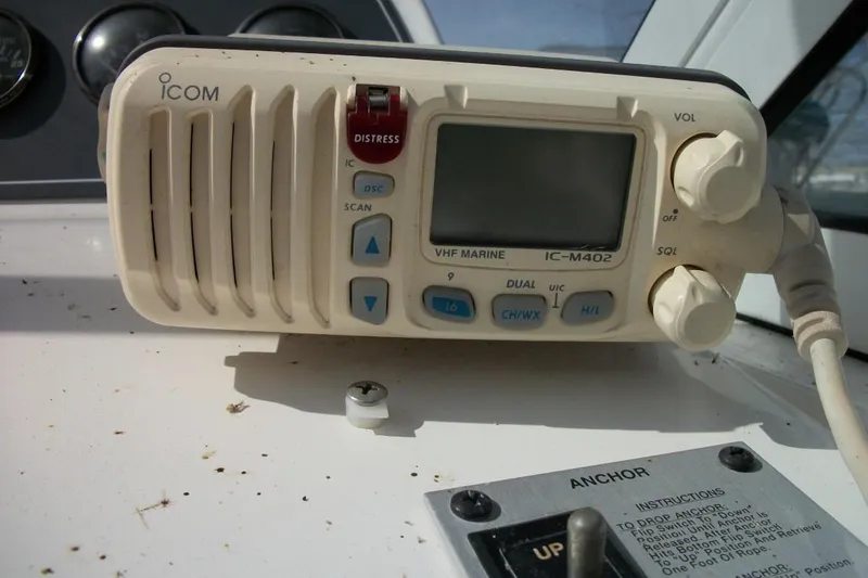 Slide: The Image of ICOM VHF Marine Radio IC-M402 on Thompson 3400 Santa Cruz, 2001 model boat dashboard. - 11