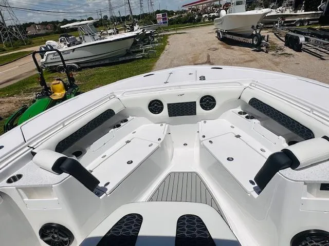 Slide: The Image of 2026 Tidewater 302 CC Adventure boat interior with spacious seating and modern design. - 7