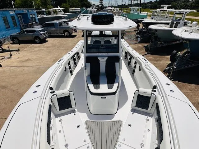 Slide: The Image of 2026 Tidewater 302 CC Adventure boat with sleek design, spacious deck, and advanced Garmin navigation. - 8
