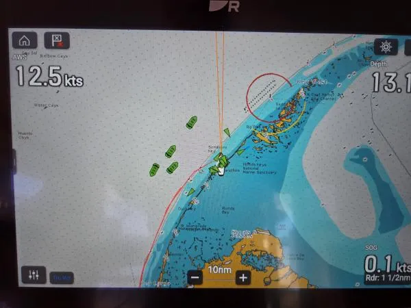 Slide: The Image of Navigation display on Fountaine Pajot Salina 48, 2008, showing speed and map details. - 15