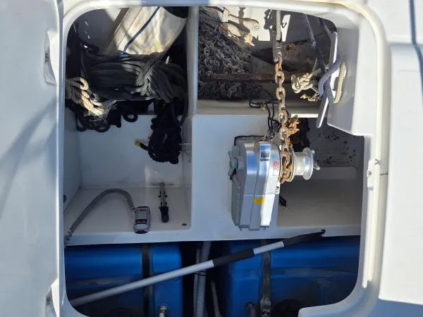 Slide: The Image of Storage compartment of 2008 Fountaine Pajot Salina 48 with ropes, anchor chain, and equipment. - 28