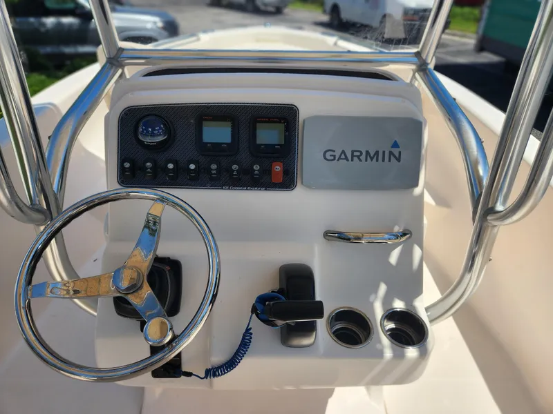 Slide: The Image of 2015 Grady-White 191 Coastal Explorer boat console with Garmin navigation system. - 11