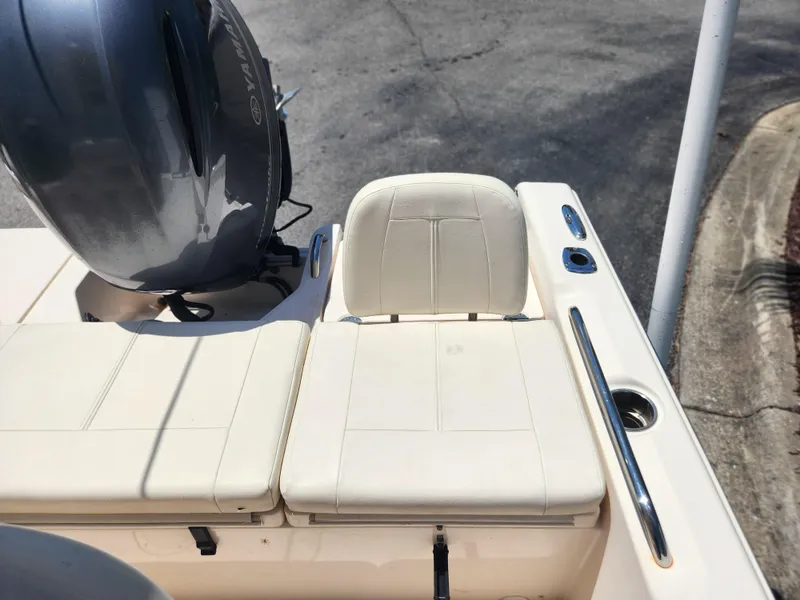 Slide: The Image of 2015 Grady-White 191 Coastal Explorer boat seat and Yamaha engine detail. - 16
