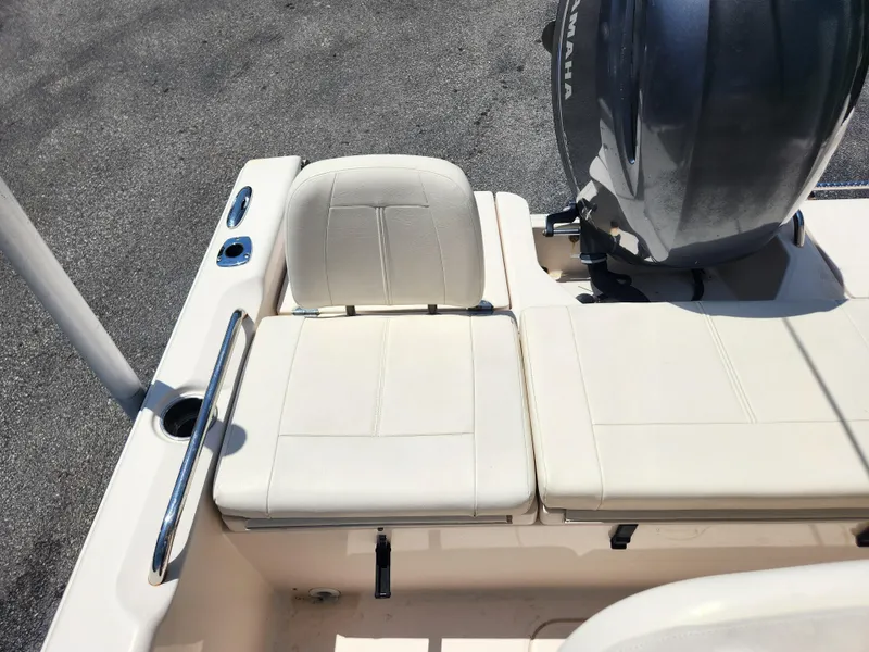 Slide: The Image of 2015 Grady-White 191 Coastal Explorer boat seating and engine detail. - 18