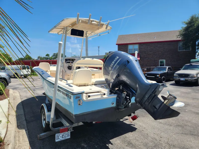Slide: The Image of 2015 Grady-White 191 Coastal Explorer boat with Yamaha outboard motor in parking lot. - 4