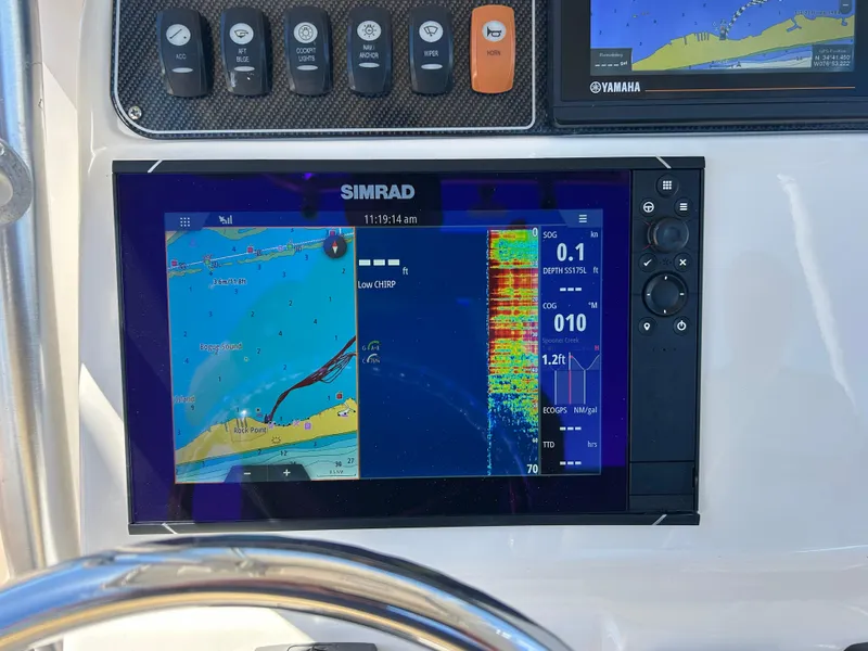Slide: The Image of Simrad marine display on 2019 Grady-White Fisherman 236 boat dashboard. - 11