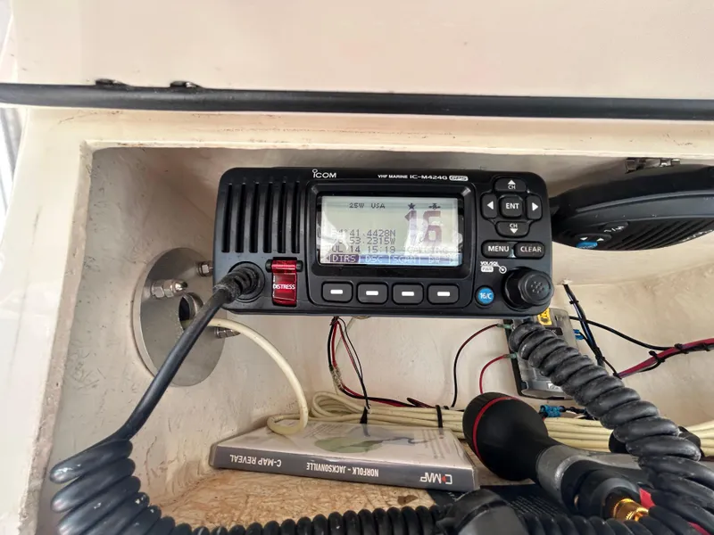 Slide: The Image of Marine radio equipment on 2019 Grady-White Fisherman 236 boat dashboard. - 19