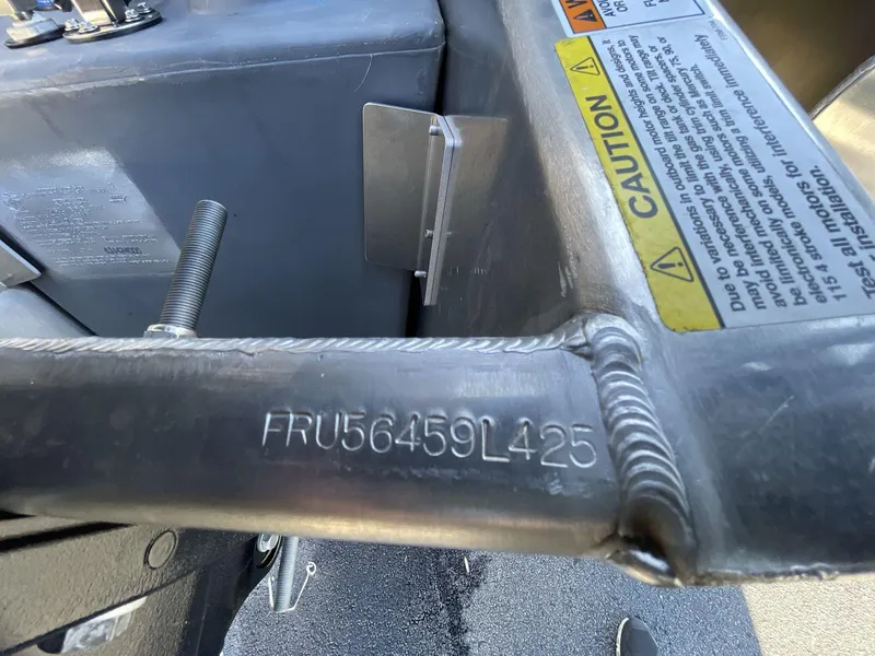 Slide: The Image of 2025 South Bay S222 Chill boat serial number and caution label close-up. - 2