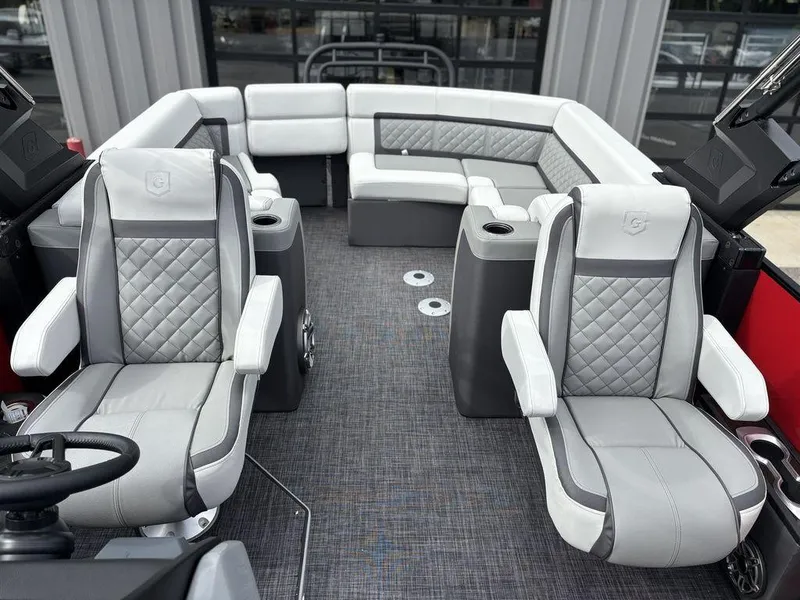 Slide: The Image of Luxurious interior of 2026 Godfrey AquaPatio 255 ULC pontoon boat with plush seating. - 15