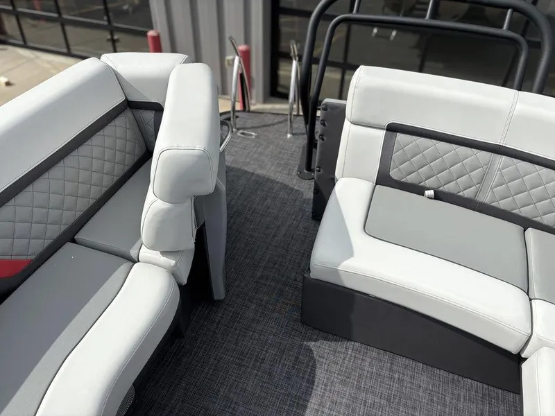 Slide: The Image of Luxurious seating on 2026 Godfrey AquaPatio 255 ULC pontoon boat, featuring quilted upholstery. - 21