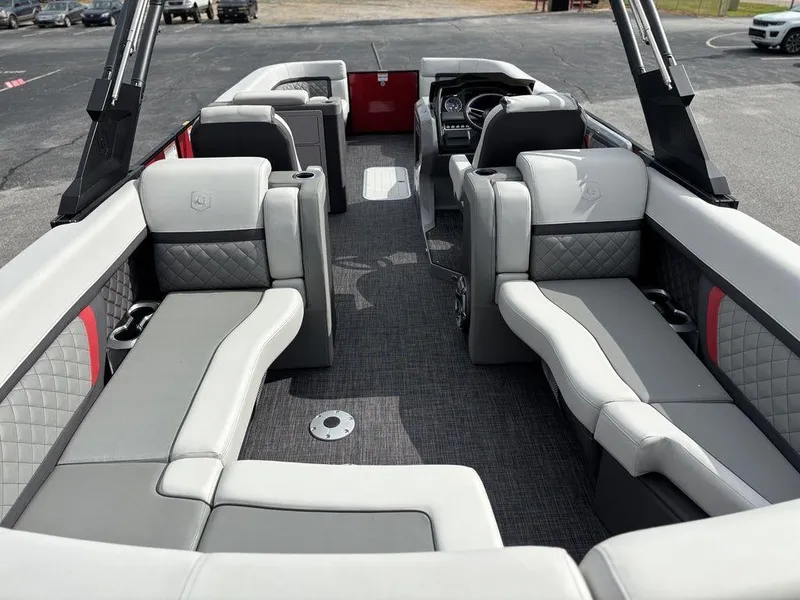 Slide: The Image of 2026 Godfrey AquaPatio 255 ULC pontoon boat interior with luxurious seating and modern design. - 23