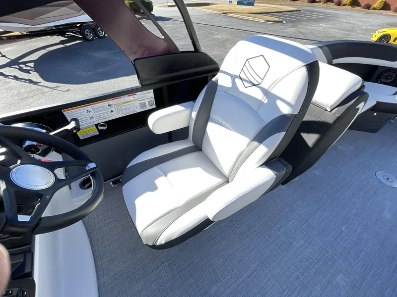 Slide: The Image of Captain's chair in 2025 South Bay S224RS boat, featuring sleek design and comfortable seating. - 23