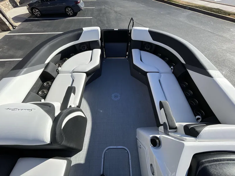 Slide: The Image of 2025 South Bay S224RS pontoon boat interior with sleek seating and modern design. - 25