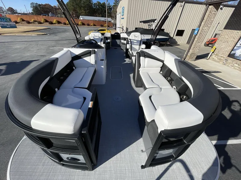 Slide: The Image of 2025 South Bay S224RS pontoon boat with spacious seating and modern design. - 27