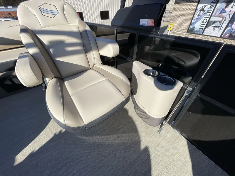 Slide: The Image of Luxurious seating and cup holders on 2025 South Bay S224RS boat. - 15