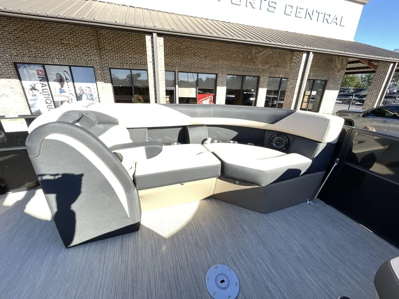 Slide: The Image of 2025 South Bay S224RS boat interior with modern seating and speaker system. - 26