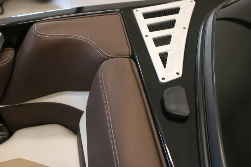 Slide: The Image of 2018 Supra SR400 interior detail with brown leather seats and white accents. - 11
