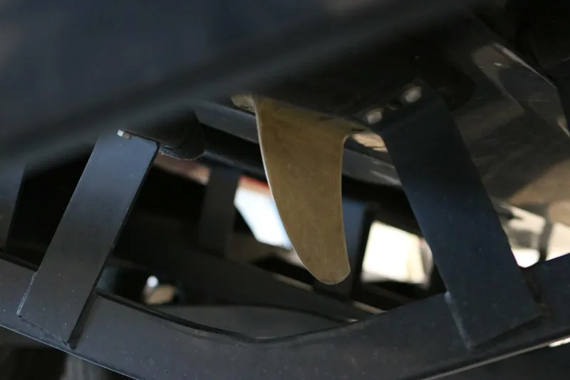 Slide: The Image of Close-up of 2018 Supra SR400 boat rudder and propeller components. - 112