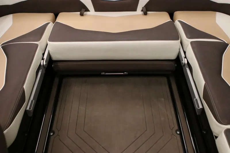 Slide: The Image of 2018 Supra SR400 interior seating with brown and beige upholstery. - 18