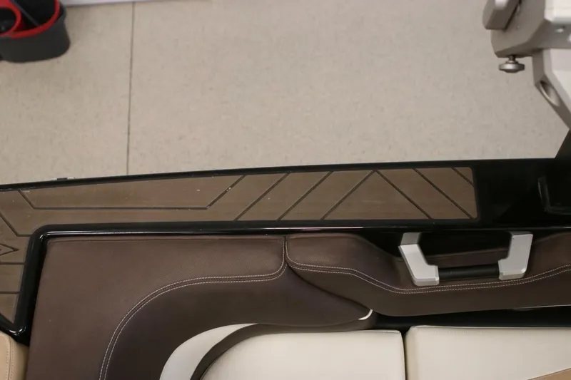 Slide: The Image of 2018 Supra SR400 interior detail with brown upholstery and sleek design elements. - 26