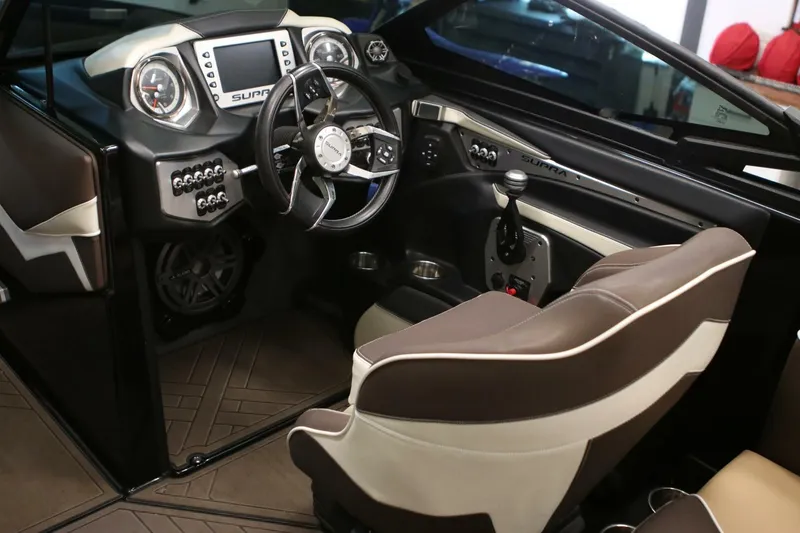 Slide: The Image of 2018 Supra SR400 interior with modern dashboard, steering wheel, and comfortable seating. - 34