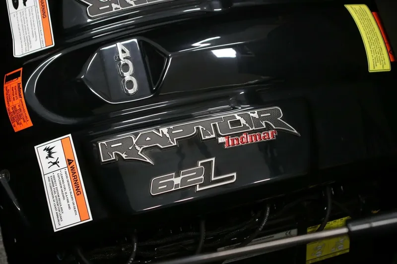 Slide: The Image of 2018 Supra SR400 engine with Raptor Indmar 6.2L branding and warning labels. - 4