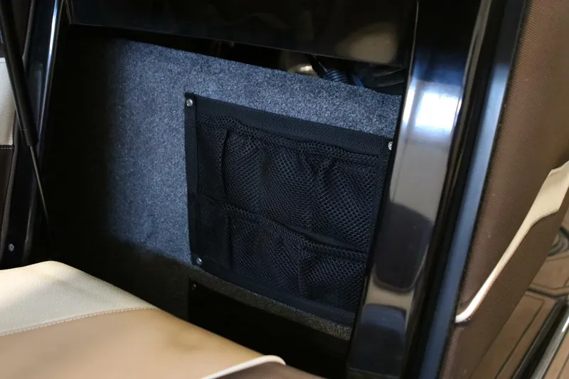 Slide: The Image of Interior storage compartment of 2018 Supra SR400 with mesh pocket detail. - 78