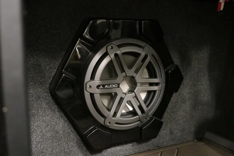 Slide: The Image of JL Audio subwoofer installed in a 2018 Supra SR400 vehicle. - 90