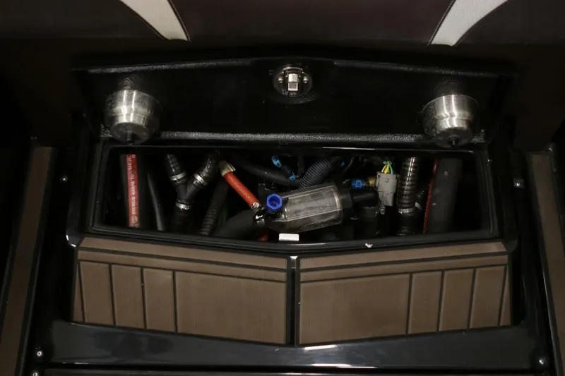 Slide: The Image of 2018 Supra SR400 engine compartment with visible hoses and components. - 98