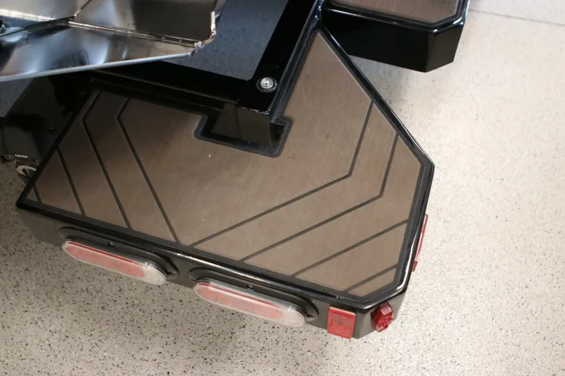 Slide: The Image of 2018 Supra SR400 vehicle step with geometric pattern and rear lights. - 120