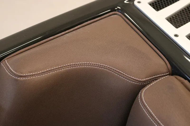 Slide: The Image of Brown leather interior detail of 2018 Supra SR400 with white stitching. - 24
