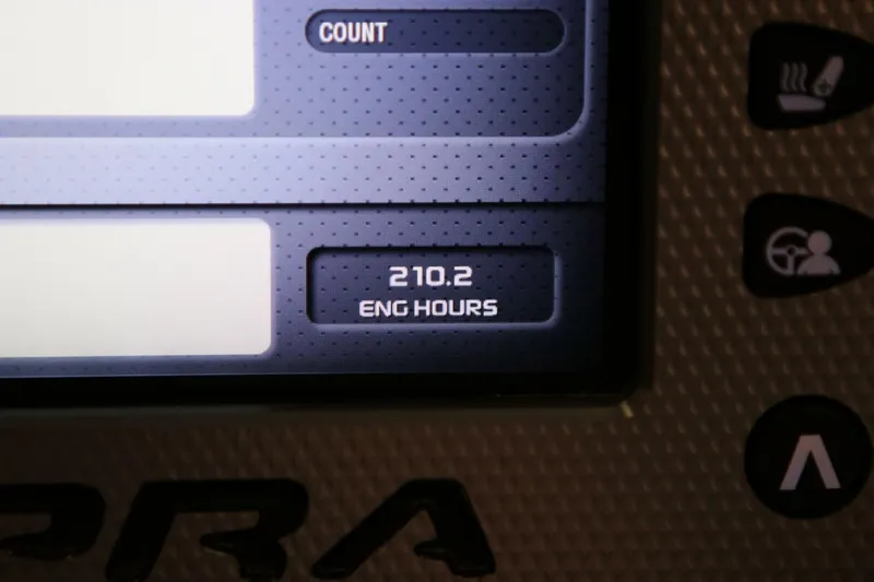 Slide: The Image of Dashboard display showing 210.2 engine hours on a 2018 Supra SR400. - 5