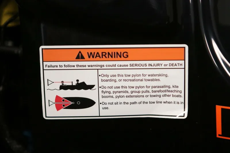 Slide: The Image of Warning label on 2018 Supra SR400 for safe tow pylon usage. - 66