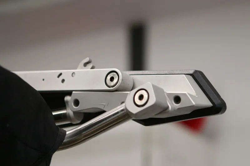 Slide: The Image of Close-up of a 2018 Supra SR400 mechanical component with metal rods and bolts. - 85